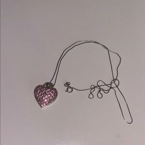 Macy's Pink and Silver Modern Necklace
Brand new condition (never worn)